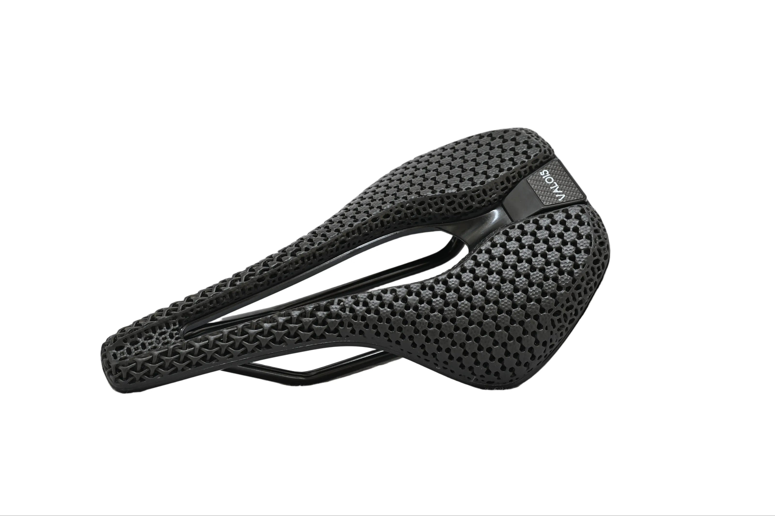 Valois Tahti 3D printed saddle, three-quarter view showing the lattice top structure