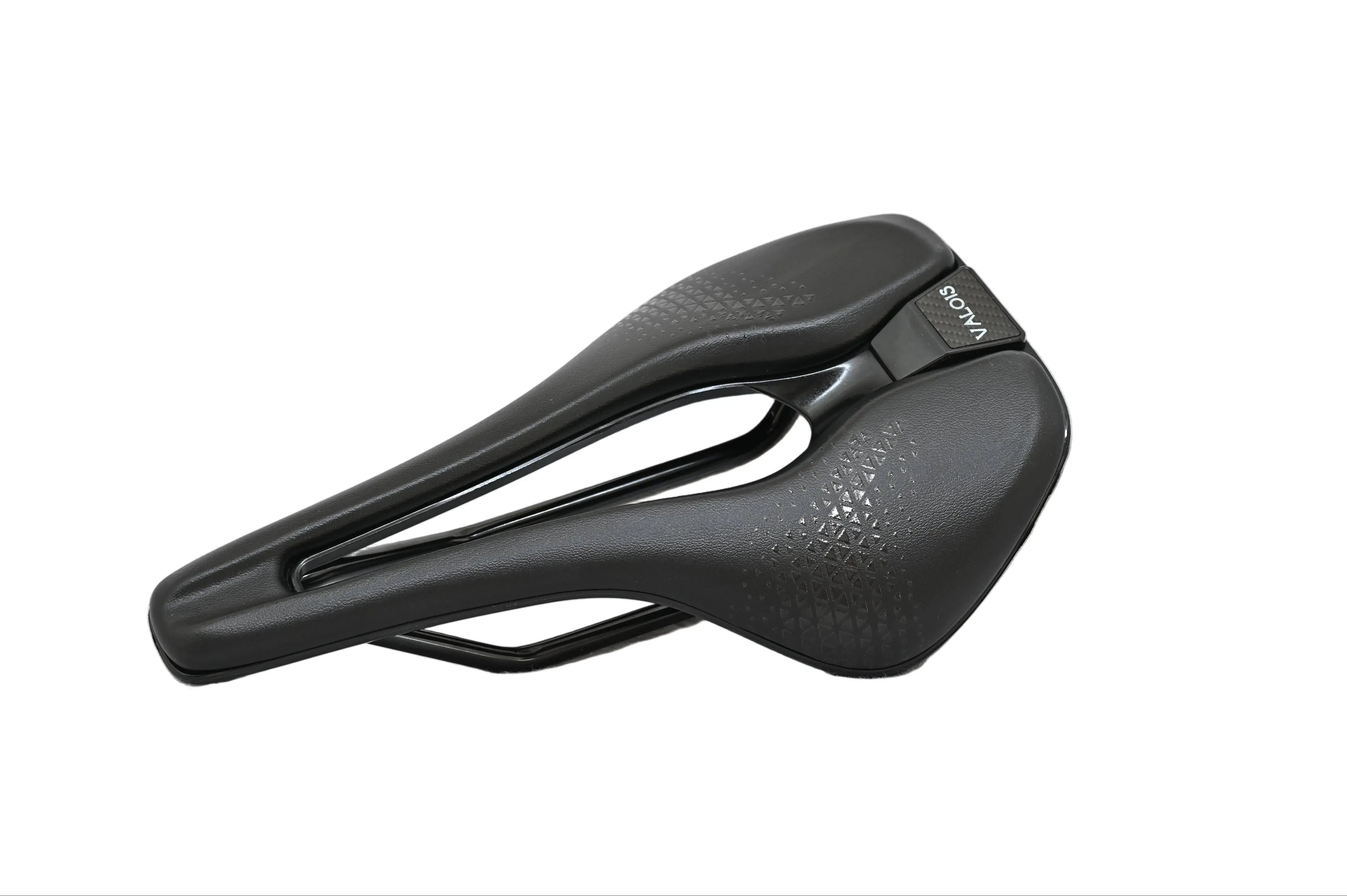 Valois Vael road saddle, three-quarter view showing the textured top and central cutout
