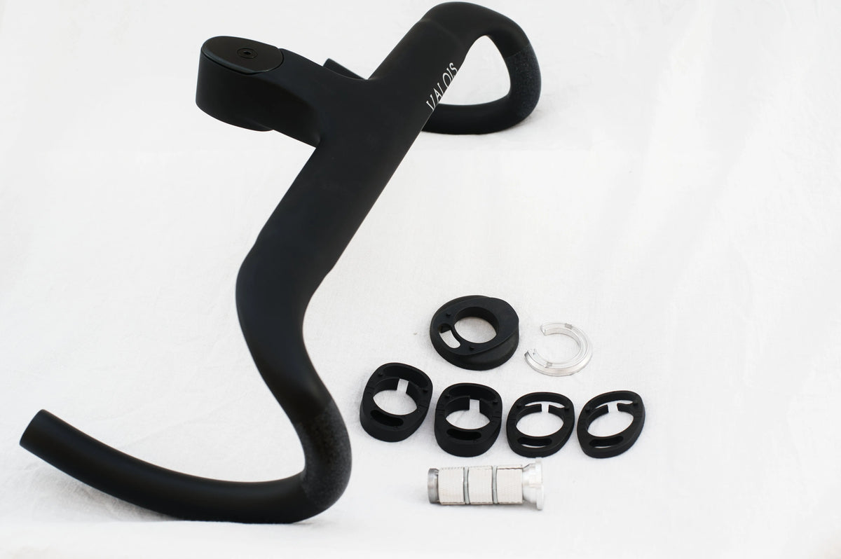 Valois Cˣ HBRD carbon cockpit with the headset spacers and fitting hardware laid out