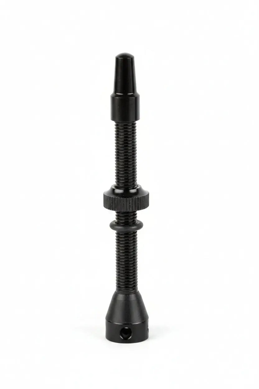 Valois tubeless valve in black with the removable core and lock ring