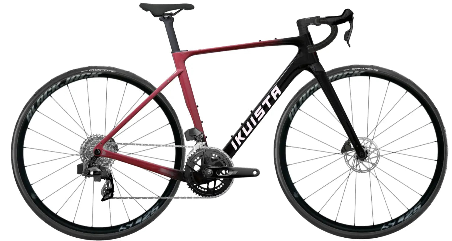 IKUISTA Spektri carbon endurance road bike in Oxide Red with SRAM Rival AXS, drive side view